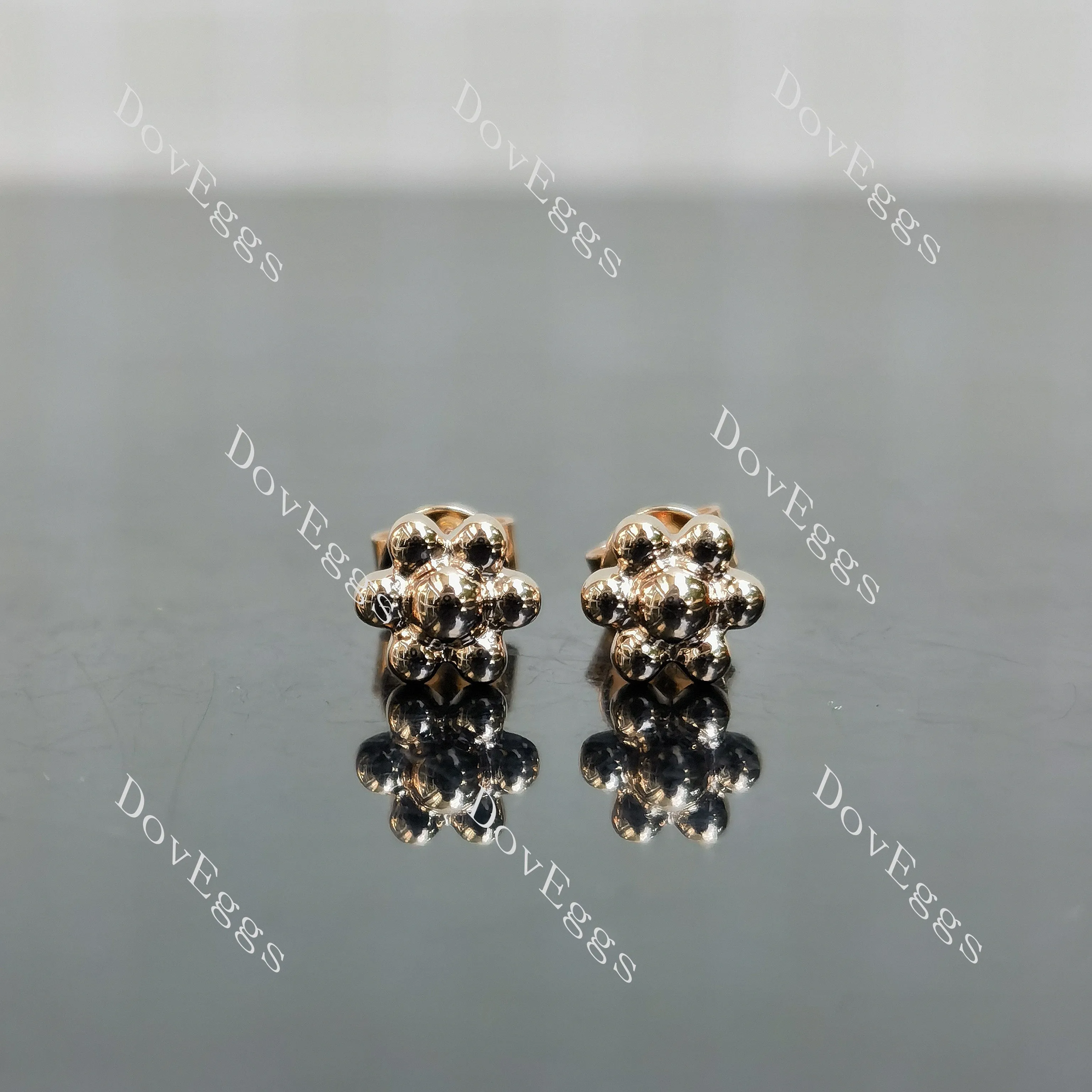 Doveggs three-dimensional flower earrings